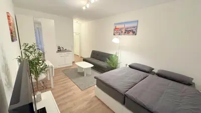 Ein Sitzbereich in der Unterkunft Modern, quiet apartment right by S-Bahn - close to Munich & airport
