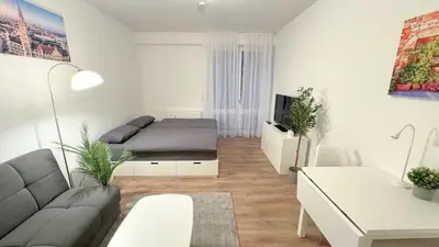Ein Sitzbereich in der Unterkunft Modern, quiet apartment right by S-Bahn - close to Munich & airport