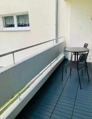 Ein Balkon oder eine Terrasse in der Unterkunft Modernes 1 Zimmer Appartement direkt am Wörthsee