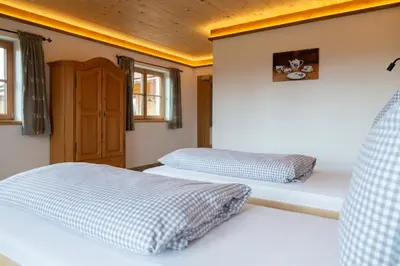 Ein Bett oder Betten in einem Zimmer der Unterkunft Kaffeekandl Café & Pension