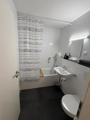 Ein Badezimmer in der Unterkunft Munich Apartments