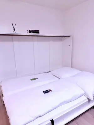 Ein Bett oder Betten in einem Zimmer der Unterkunft Munich Apartments