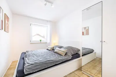 Ein Bett oder Betten in einem Zimmer der Unterkunft Wundervolle Ferienwohnung am Kloster Andechs