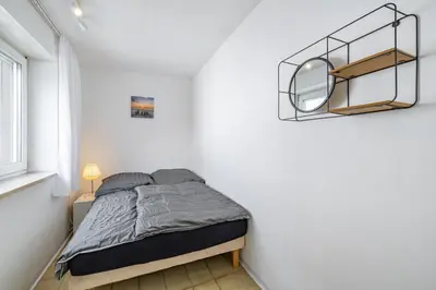 Ein Bett oder Betten in einem Zimmer der Unterkunft Wundervolle Ferienwohnung am Kloster Andechs