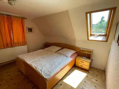 Ein Bett oder Betten in einem Zimmer der Unterkunft Ferienwohnung Maslanka DG