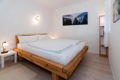 Ein Bett oder Betten in einem Zimmer der Unterkunft Ferienwohnung Rotkehlchen, Whg 8