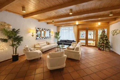 Ein Sitzbereich in der Unterkunft Hotel Aqua