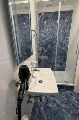 Ein Badezimmer in der Unterkunft Hotel Aqua