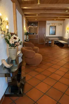 Ein Sitzbereich in der Unterkunft Hotel Aqua