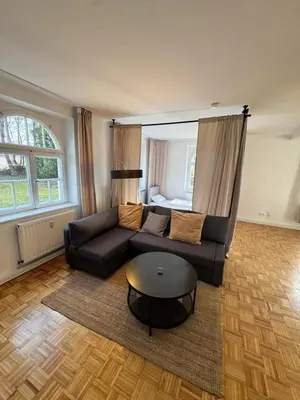 Ein Sitzbereich in der Unterkunft Bavaria Home - Terrasse, Küche, Parken