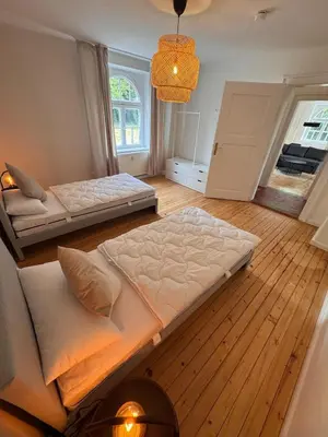 Ein Bett oder Betten in einem Zimmer der Unterkunft Bavaria Home - Terrasse, Küche, Parken
