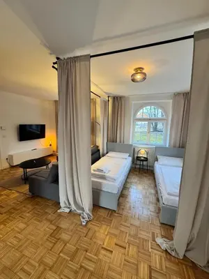 Ein Bett oder Betten in einem Zimmer der Unterkunft Bavaria Home - Terrasse, Küche, Parken