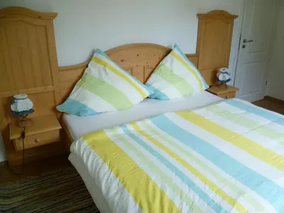 Ein Bett oder Betten in einem Zimmer der Unterkunft Bayerisch Wohnen