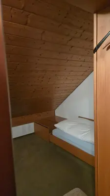 Ein Bett oder Betten in einem Zimmer der Unterkunft PensionSchilling