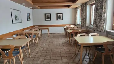 Ein Restaurant oder anderes Speiselokal in der Unterkunft PensionSchilling