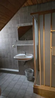 Ein Badezimmer in der Unterkunft PensionSchilling