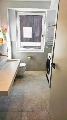 Ein Bett oder Betten in einem Zimmer der Unterkunft Beautiful new L apartment -15 min to Octoberfest