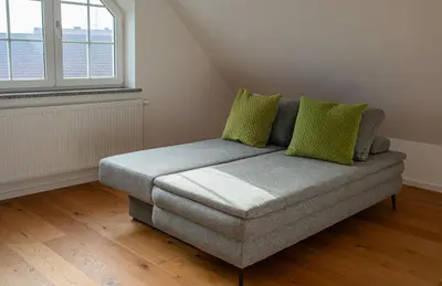 Ein Bett oder Betten in einem Zimmer der Unterkunft Ferienwohnung Demmelbach