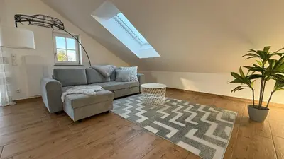 Ein Sitzbereich in der Unterkunft modern & spacious Apartments CarHandling Campus -Nähe Therme Erding -Messe München -Arena -free parking -Netflix -W-LAN