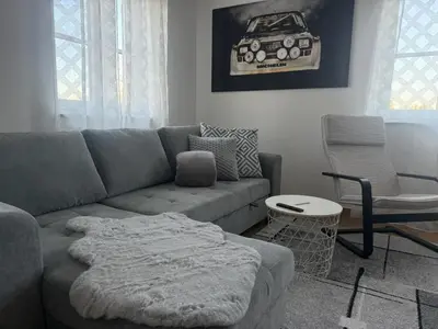 Ein Sitzbereich in der Unterkunft modern & spacious Apartments CarHandling Campus -Nähe Therme Erding -Messe München -Arena -free parking -Netflix -W-LAN