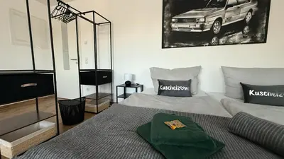 Ein Bett oder Betten in einem Zimmer der Unterkunft modern & spacious Apartments CarHandling Campus -Nähe Therme Erding -Messe München -Arena -free parking -Netflix -W-LAN