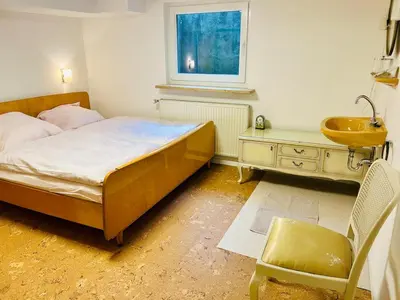Ein Bett oder Betten in einem Zimmer der Unterkunft Cozy house with courtyard