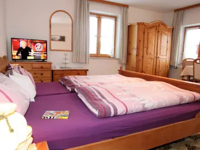 Ein Bett oder Betten in einem Zimmer der Unterkunft Apartment Appartement in Bad Bayersoien mit Großem Garten by Interhome