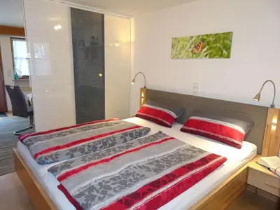 Ein Bett oder Betten in einem Zimmer der Unterkunft Apartment Igel by Interhome
