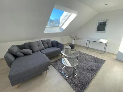 Ein Sitzbereich in der Unterkunft 2 Zimmer-Wohnung ruhig modern zentrumsnah
