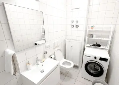 Ein Badezimmer in der Unterkunft Augusta Prima für bis zu 7 Gäste- Stilvolles Apartment im Zentrum nahe Rathaus - Hochwertige Betten und Bettwäsche - Voll ausgestattete Küche - 4K Smart TV - Aufzug - Kostenlose Nacht Tiefgarage 20-30 bis 9-30 Uhr mit 28 Stellplätzen je nach Verfügbarkeit