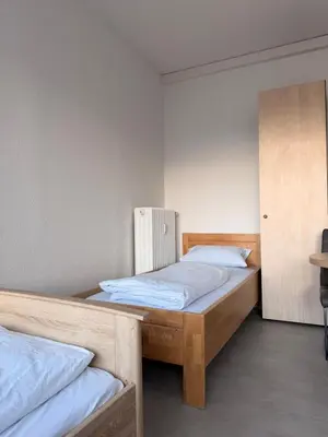 Ein Bett oder Betten in einem Zimmer der Unterkunft Haus an der Brücke