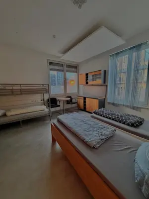 Ein Bett oder Betten in einem Zimmer der Unterkunft Haus an der Brücke