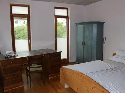 Ein Bett oder Betten in einem Zimmer der Unterkunft Holiday home in Murnau with swimming pool