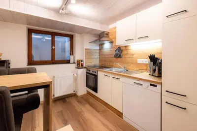 Küche/Küchenzeile in der Unterkunft Ferienwohnung Hans - Hohenpeißenberg mit Gartenblick
