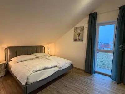 Ein Bett oder Betten in einem Zimmer der Unterkunft Perfekt für 2-4! Küche Garage Flughafen Nespresso