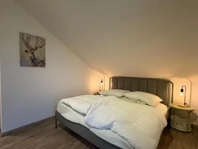 Ein Bett oder Betten in einem Zimmer der Unterkunft Perfekt für 2-4! Küche Garage Flughafen Nespresso
