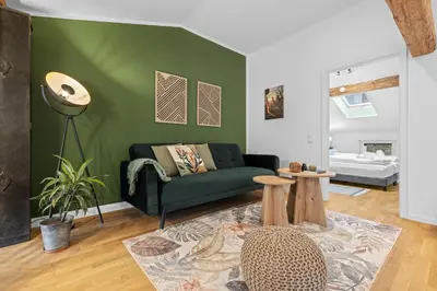 Ein Bett oder Betten in einem Zimmer der Unterkunft Design Apartment No 3 Gmund am Tegernsee by BALANCED