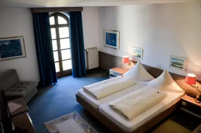 Ein Bett oder Betten in einem Zimmer der Unterkunft Hotel Rössle