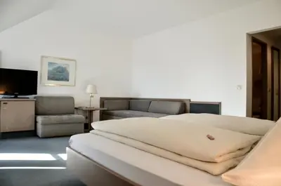 Ein Bett oder Betten in einem Zimmer der Unterkunft Hotel Rössle