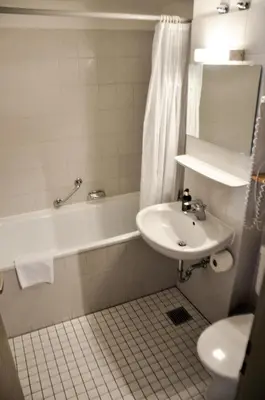 Ein Badezimmer in der Unterkunft Hotel Rössle