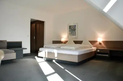 Ein Bett oder Betten in einem Zimmer der Unterkunft Hotel Rössle
