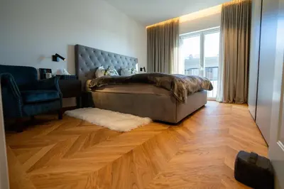 Ein Bett oder Betten in einem Zimmer der Unterkunft Außergewöhnliches lichtdurchflutetes Penthouse im Zentrum