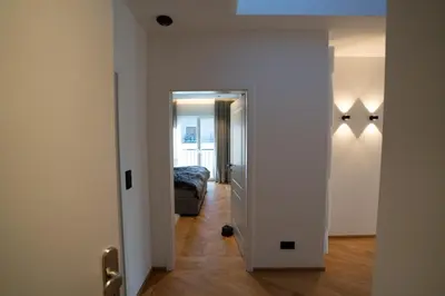 Ein Bett oder Betten in einem Zimmer der Unterkunft Außergewöhnliches lichtdurchflutetes Penthouse im Zentrum