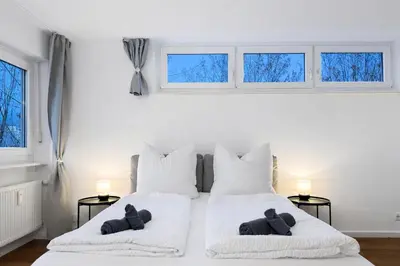 Ein Bett oder Betten in einem Zimmer der Unterkunft Stilvolles Studio für bis zu 6 Gäste - Balkon & Parkplatz