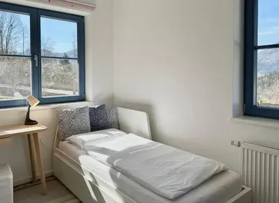 Ein Bett oder Betten in einem Zimmer der Unterkunft Ein Haus am Berg