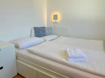 Ein Bett oder Betten in einem Zimmer der Unterkunft Ein Haus am Berg