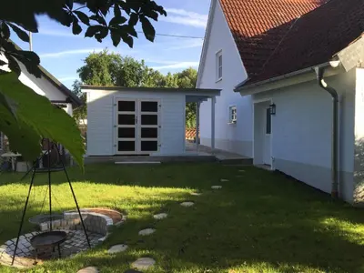 Ein Garten an der Unterkunft Ilmhaus