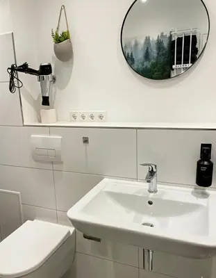 Ein Badezimmer in der Unterkunft 1,5-Zimmer, Top ausgestattet, 4 Pers, Souterrain, Self Check-in, Parkplatz, Netflix & Amazon Prime