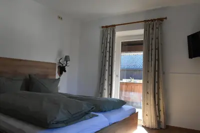 Ein Bett oder Betten in einem Zimmer der Unterkunft Landhaus Petri