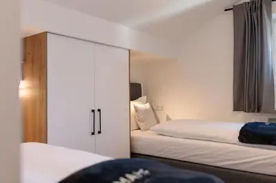 Ein Bett oder Betten in einem Zimmer der Unterkunft Heu22 Heuboden